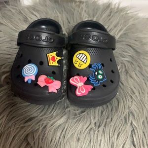 CROCS with shoe charms included